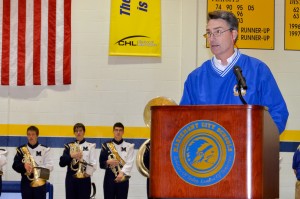 Bill Flynn speaks at Coach Crosby's farewell ceremony after his final. 