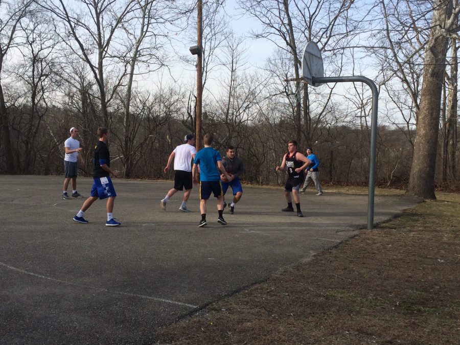 Mariemont students playing basketball at the Log Cabin, one of the many places the TPPD patrol (PHOTO BY ZACK).