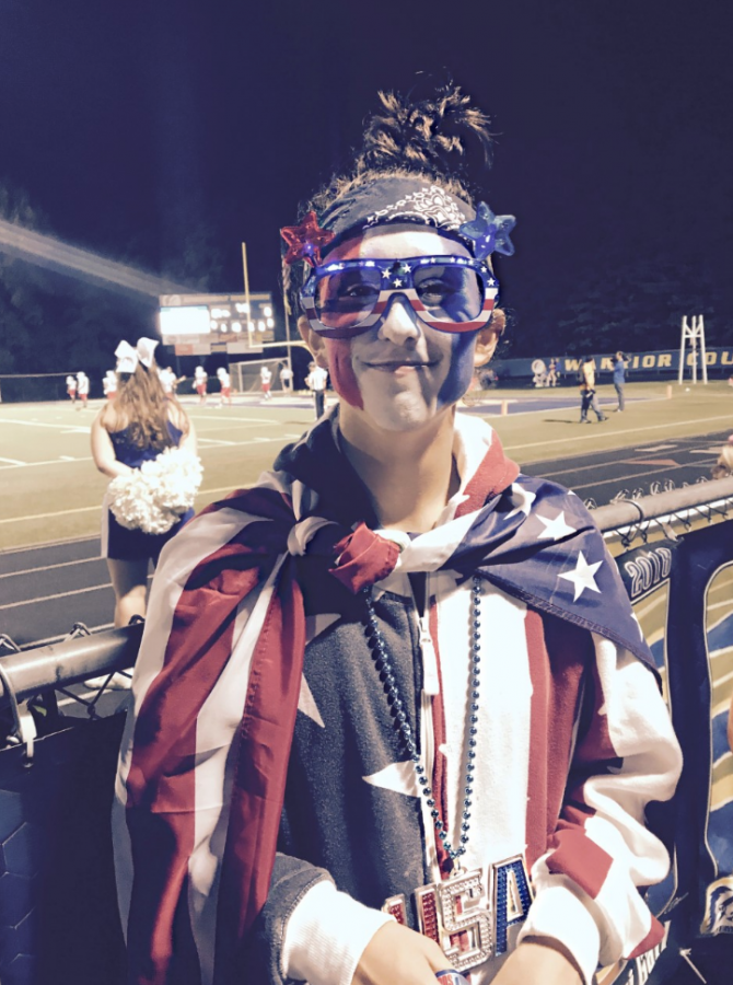 Senior Sydney Nicholson showing her school spirit at the USA themed football game. (PHOTO BY KROMER)