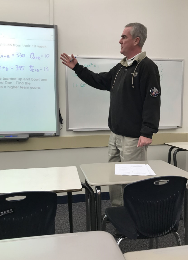 Fashionista Mr. Wainscott rocking one of his favorite outfits while teaching one of his AP Stats classes. (PHOTO BY KROMER)