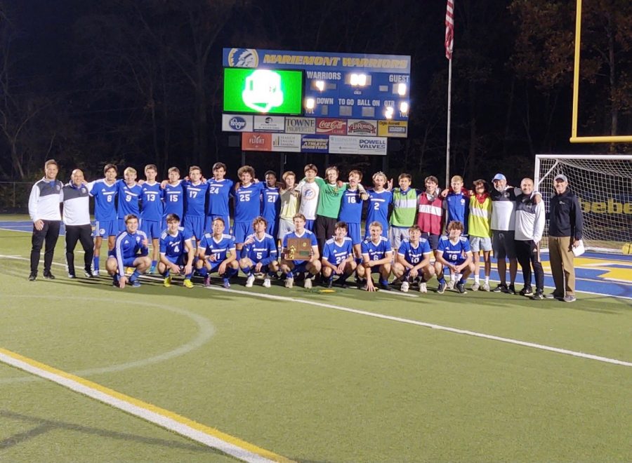 Boys+Soccer+holds+Regional+Championship+trophy+after+defeating+Botkins+4-0+on+Saturday.+%28Photo+from+%40mmontad+on+Twitter%29